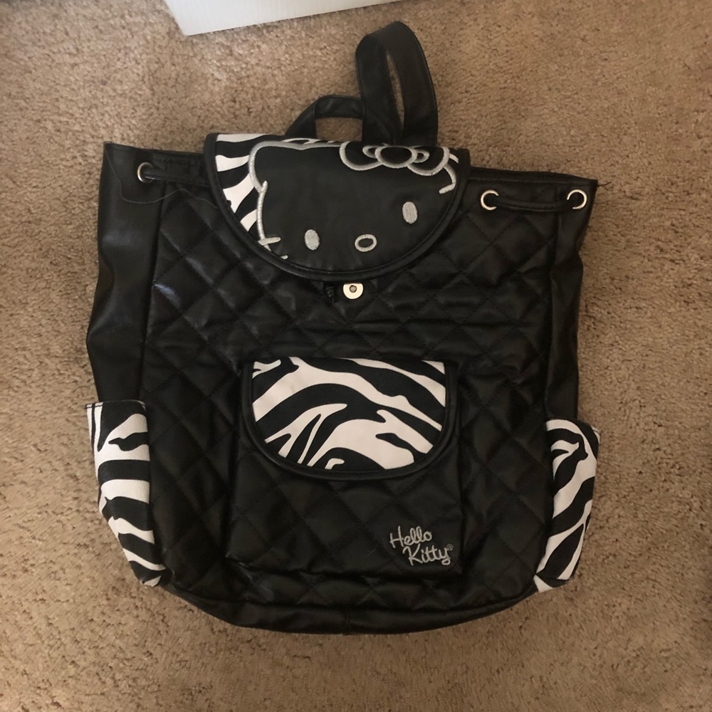 White and black hello kitty backpack